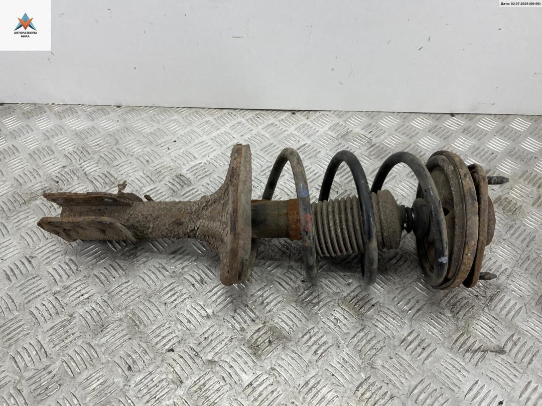 стойка передняя Mitsubishi Lancer 9 поколение 2003, 2.0 л., бензин, МКПП, синий, универсал - фото №1