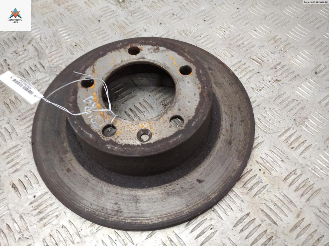 диск тормозной задний Nissan Interstar 1 поколение 2008, 2.5 л., дизель, МКПП, белый, микроавтобус - фото №1