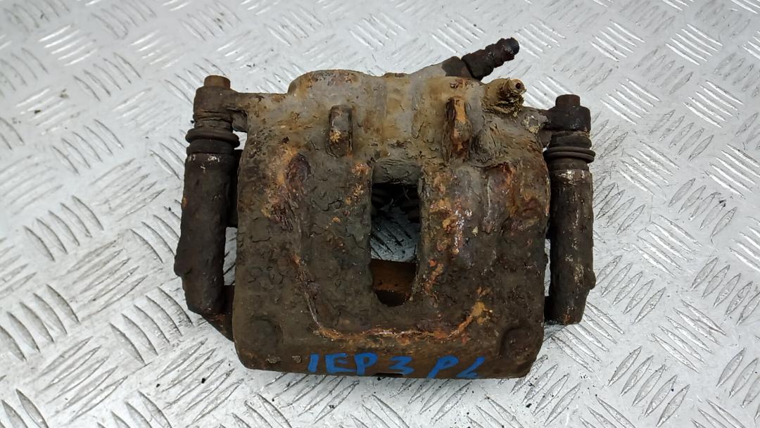 суппорт передний левый Renault Trafic 2 поколение 2005, 1.9 л., дизель, МКПП, микроавтобус - фото №1