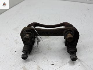 скоба суппорта Kia Carens 3 поколение 2006, 2.0 л., дизель, МКПП, серый, минивэн