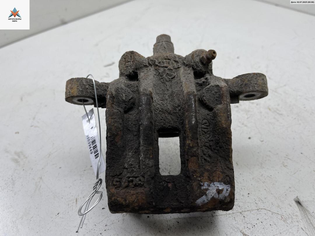 суппорт задний правый Kia Rio 2 поколение 2006, 1.4 л., бензин, МКПП, синий, хетчбэк 5 дв. - фото №1