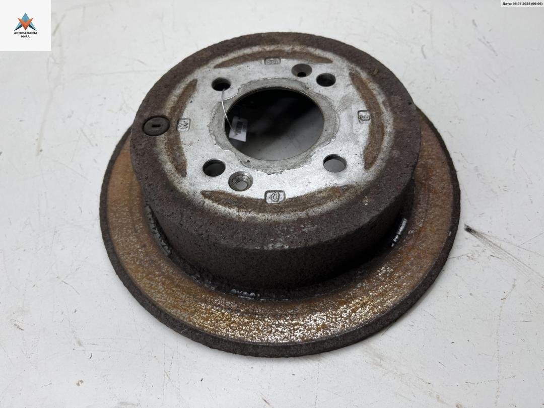 диск тормозной задний Kia Rio 2 поколение 2006, 1.4 л., бензин, МКПП, синий, хетчбэк 5 дв. - фото №1