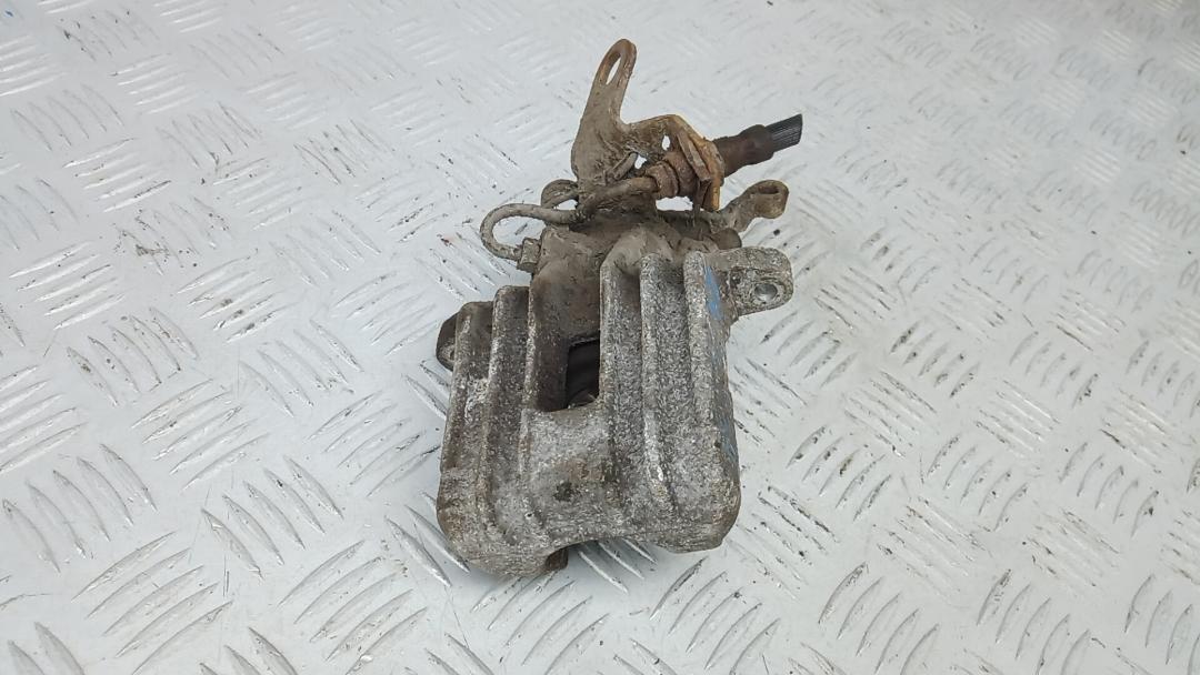 суппорт задний левый Skoda Octavia 2 поколение (A5) 2006, 1.9 л., D TDI PD, дизель, МКПП, хетчбэк 5 дв., 1K0615423J - фото №1