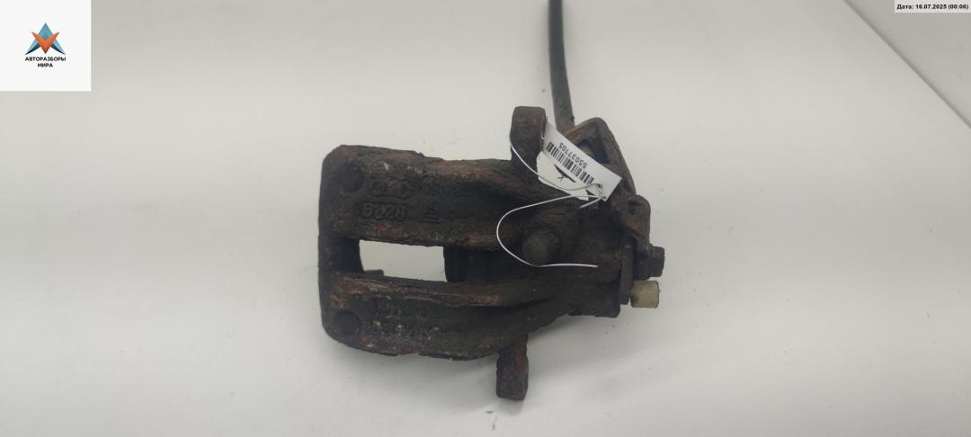 суппорт задний левый Audi A6 4A/C4 1997, 2.5 л., дизель, МКПП, зелёный, универсал - фото №1