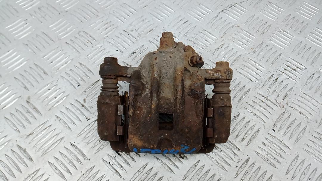 суппорт задний левый Kia Sportage 2 поколение 2004, 2.0 л., дизель, АКПП, внедорожник 5 дв., 582102E300 - фото №1