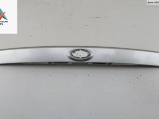 накладка подсветки номера Kia Carens 3 поколение 2006, 2.0 л., дизель, МКПП, серый, минивэн, 87311-1D000