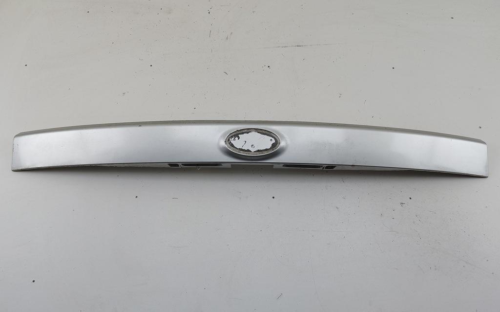 накладка подсветки номера Kia Carens UN) 2006, 2.0 л., дизель, МКПП, серый, минивэн, 87311-1D000