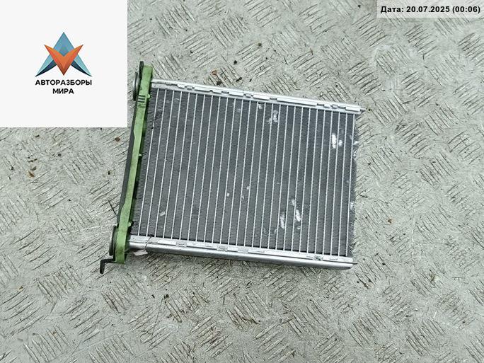 радиатор отопителя (печки) Renault Scenic 3 поколение 2011, 1.4 л., бензин, МКПП, чёрный, минивэн - фото №1