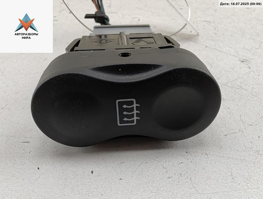 кнопка обогрева заднего стекла Dacia (Renault) Sandero I 2008, 1.4 л., бензин, МКПП, синий, хетчбэк 5 дв., 710682 - фото №1