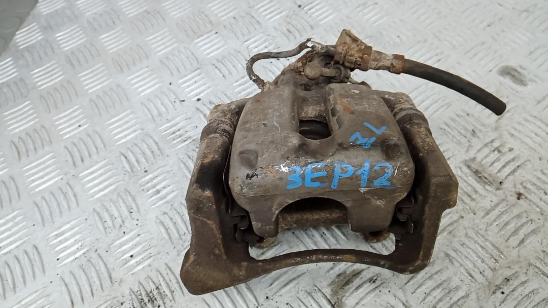 суппорт задний левый Volkswagen Passat B6 2007, 2.0 л., дизель, МКПП, универсал, 3C0615403E - фото №1