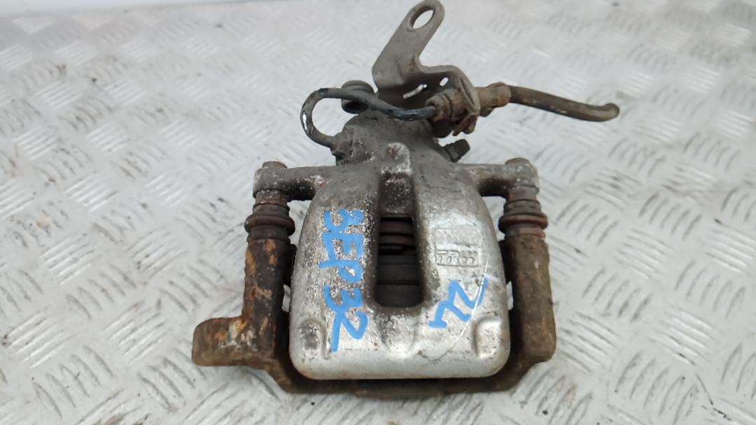 суппорт задний левый Volkswagen Touran 1 поколение 2005, 1.9 л., дизель, МКПП, минивэн, 1K0615423M - фото №1