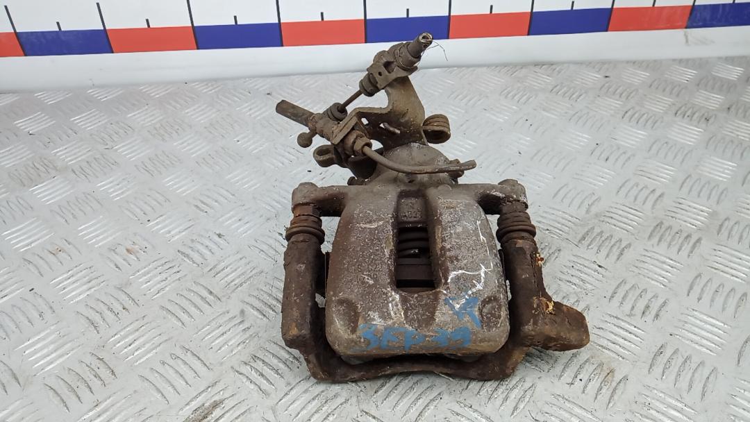 суппорт задний правый Volkswagen Touran 1 поколение 2005, 1.9 л., дизель, МКПП, минивэн, 1K0615424M - фото №1