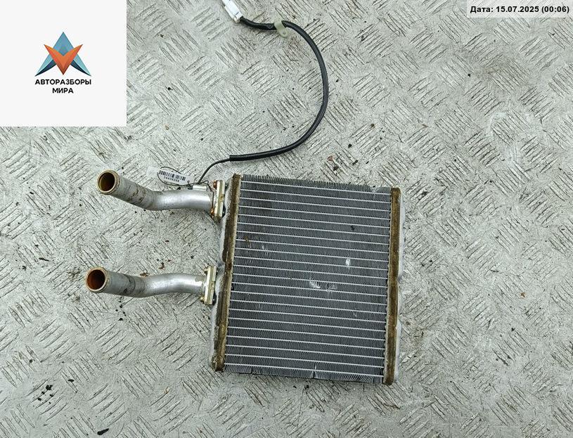 радиатор отопителя (печки) SsangYong Musso 1 поколение 1996, 2.3 л., бензин, АКПП, синий, внедорожник 5 дв. - фото №1