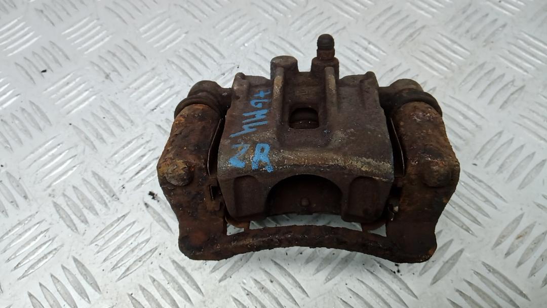 суппорт задний правый Kia Ceed 1 поколение 2008, 1.4 л., бензин, МКПП, хетчбэк 5 дв. - фото №1