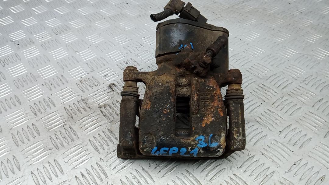 суппорт задний левый Volkswagen Passat B6 2007, 2.0 л., дизель, МКПП, универсал - фото №1