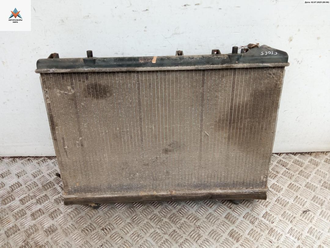 радиатор охлаждения SsangYong Musso 1 поколение 1996, 2.3 л., бензин, АКПП, синий, внедорожник 5 дв. - фото №1