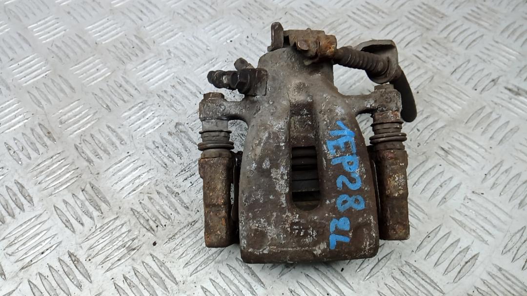 суппорт задний левый Opel Zafira 3 поколение (C) 2011, 1.6 л., бензин, МКПП, минивэн - фото №1