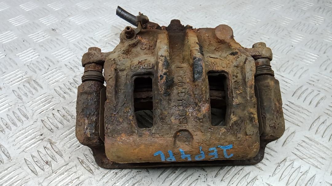 суппорт передний левый Hyundai Santa Fe 2 поколение (CM) 2007, 2.2 л., дизель, МКПП, внедорожник 5 дв., 581102B700, 581802BA10 - фото №1