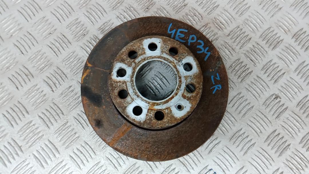 диск тормозной задний Volkswagen Jetta 5 поколение 2008, 1.9 л., дизель, МКПП, седан, 1K0615601AC - фото №1