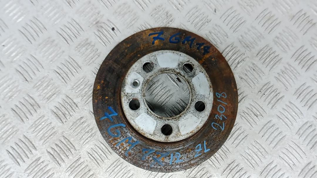 диск тормозной задний Skoda Rapid 1 поколение 2014, 1.6 л., дизель, АКПП, хетчбэк 5 дв., 1J0615601P - фото №1