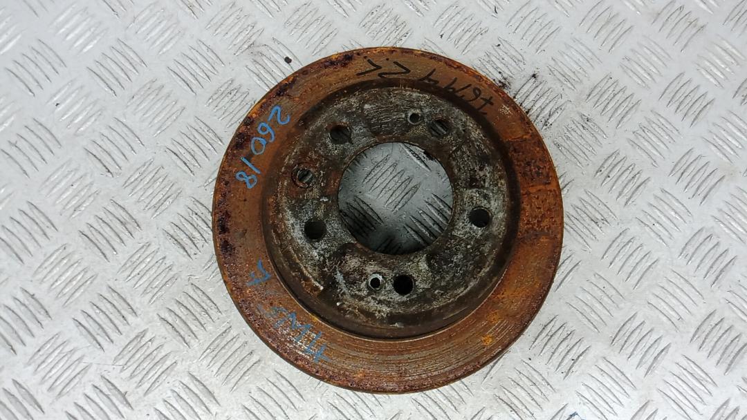 диск тормозной задний Kia Ceed 1 поколение 2008, 1.4 л., бензин, МКПП, хетчбэк 5 дв. - фото №1