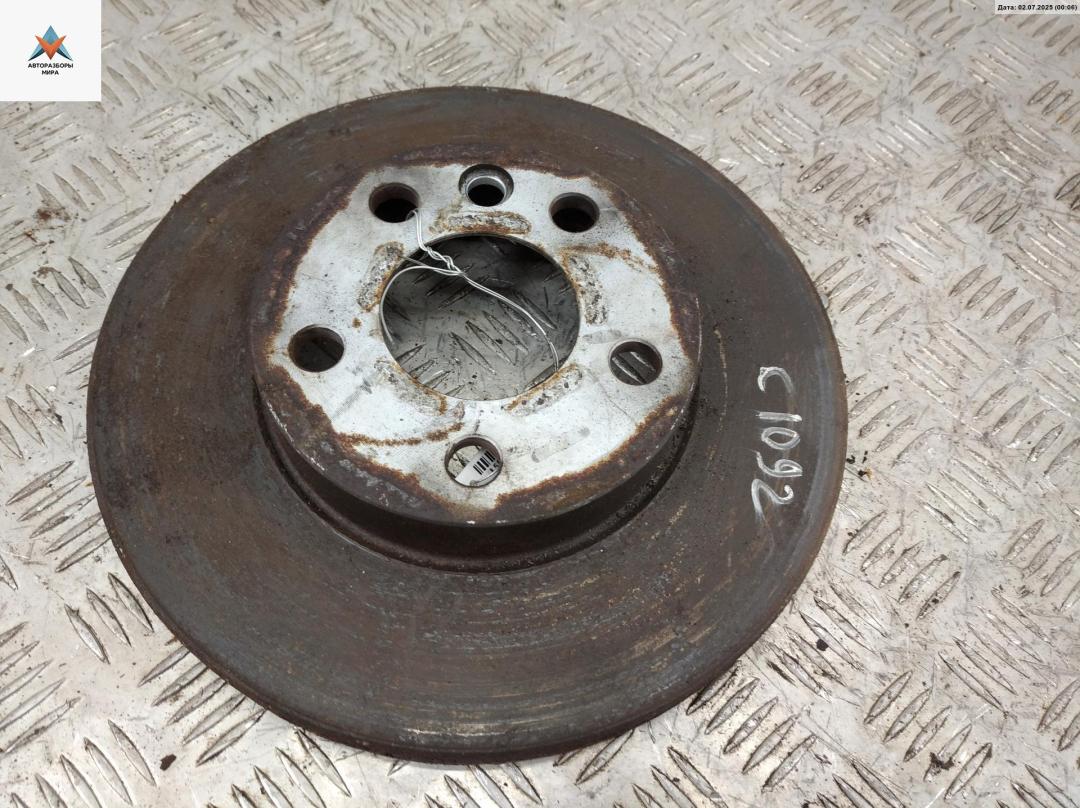 диск тормозной передний Volkswagen Transporter T4 1999, 2.5 л., дизель, МКПП, белый, микроавтобус - фото №1