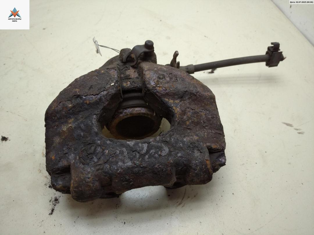 суппорт передний левый Volkswagen Transporter T4 1999, 2.5 л., дизель, МКПП, белый, микроавтобус - фото №1