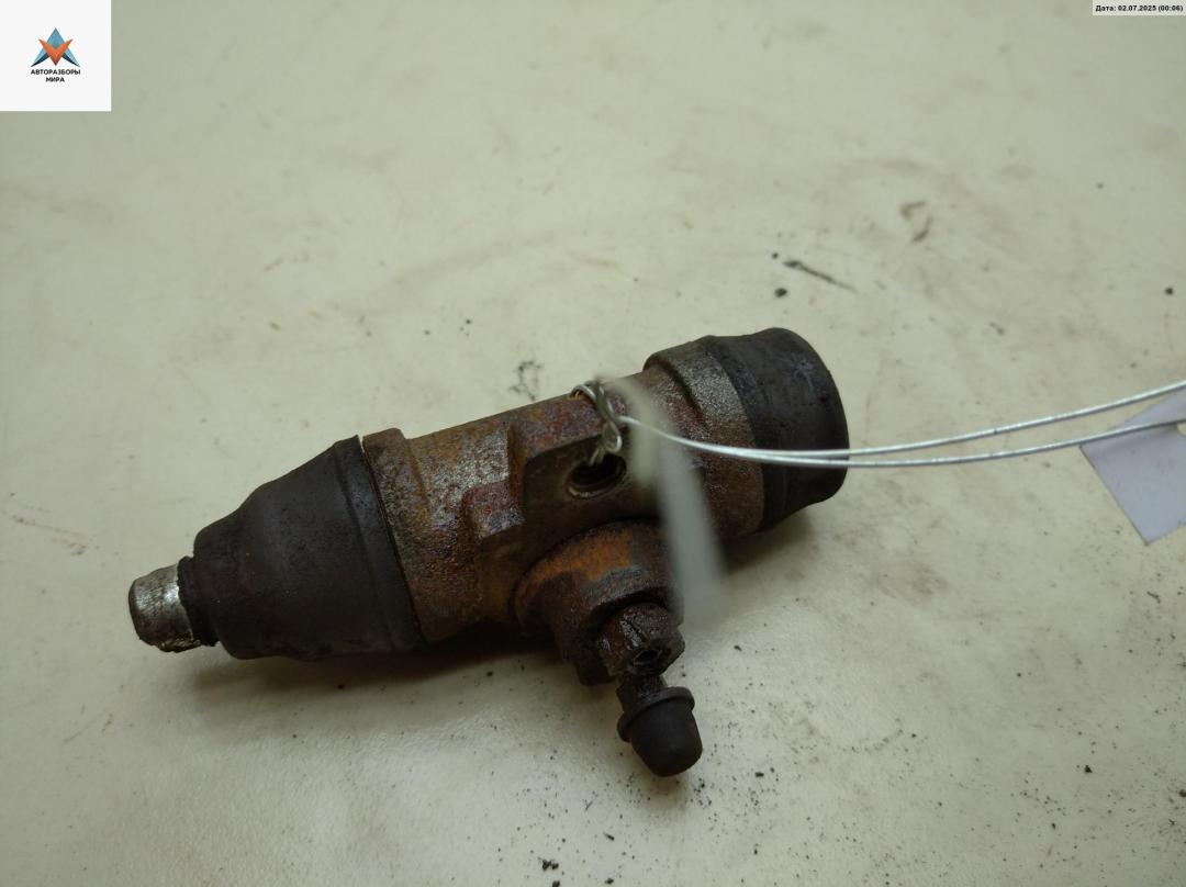 цилиндр тормозной рабочий Volkswagen Transporter T4 1995, 2.4 л., дизель, МКПП, белый, микроавтобус - фото №1