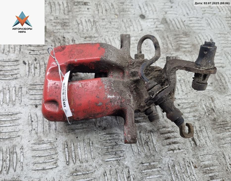 суппорт задний левый Skoda Octavia mk2 (A5 1Z) 2005, 2.0 л., дизель, МКПП, зелёный, универсал - фото №1