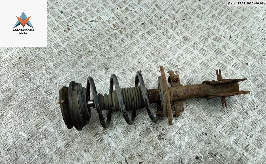 стойка передняя Renault Laguna 2 поколение 2003, 2.0 л., бензин, АКПП, серый, универсал, 8200117296 - фото №1