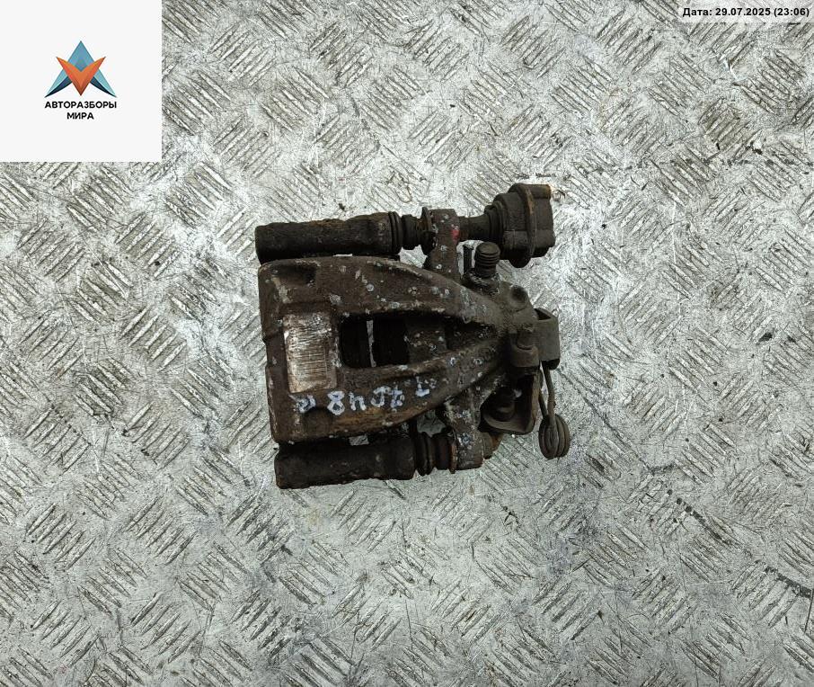 суппорт задний левый Peugeot 207 1 поколение 2008, 1.6 л., бензин, МКПП, серый, универсал, 9683865280 - фото №1