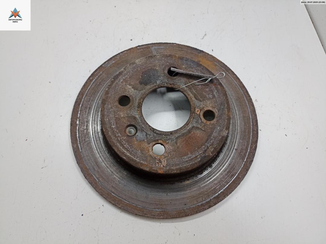 диск тормозной задний Opel Astra G 2001, 1.2 л., бензин, МКПП, синий, хетчбэк 5 дв. - фото №1