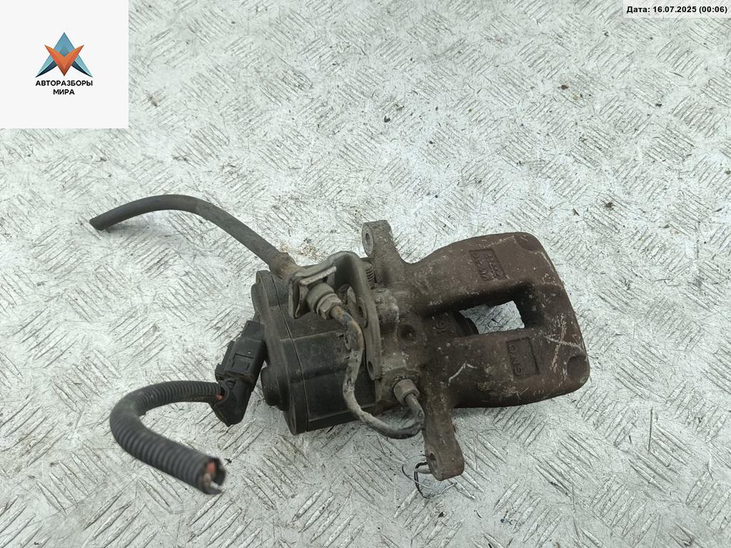 суппорт задний левый Volkswagen Passat B6 2007, 2.0 л., дизель, МКПП, синий, универсал, TRW - фото №1