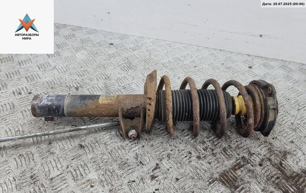 стойка передняя Volkswagen Passat B6 2005, 1.6 л., бензин, МКПП, синий, универсал - фото №1