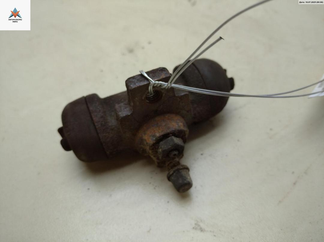 цилиндр тормозной рабочий Volkswagen Transporter T4 1992, 2.4 л., дизель, МКПП, серый, микроавтобус - фото №1