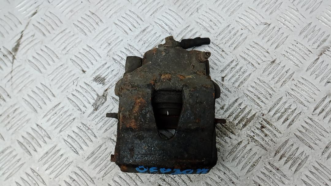 суппорт передний левый Volkswagen Jetta 5 поколение 2008, 1.9 л., дизель, МКПП, седан, 1K0615123D - фото №1