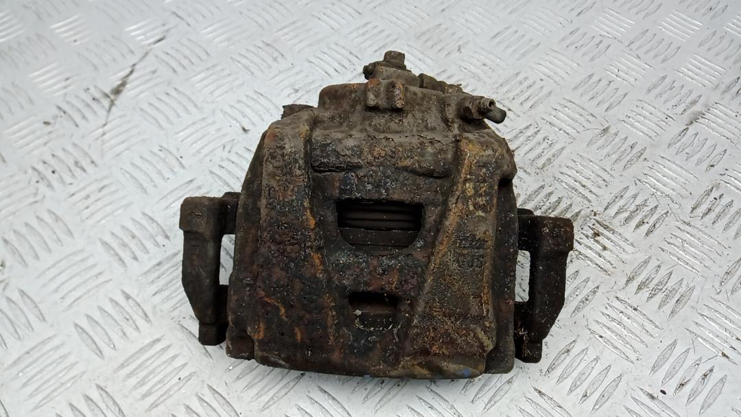 суппорт передний левый Volkswagen Tiguan 1 поколение 2009, 2.0 л., дизель, МКПП, внедорожник 5 дв., 5N0615123 - фото №1