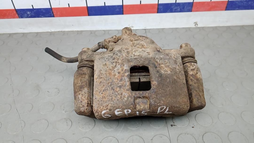 суппорт передний левый Isuzu Trooper 2 поколение 2002, 3.0 л., D DT, дизель, МКПП, внедорожник 5 дв. - фото №1