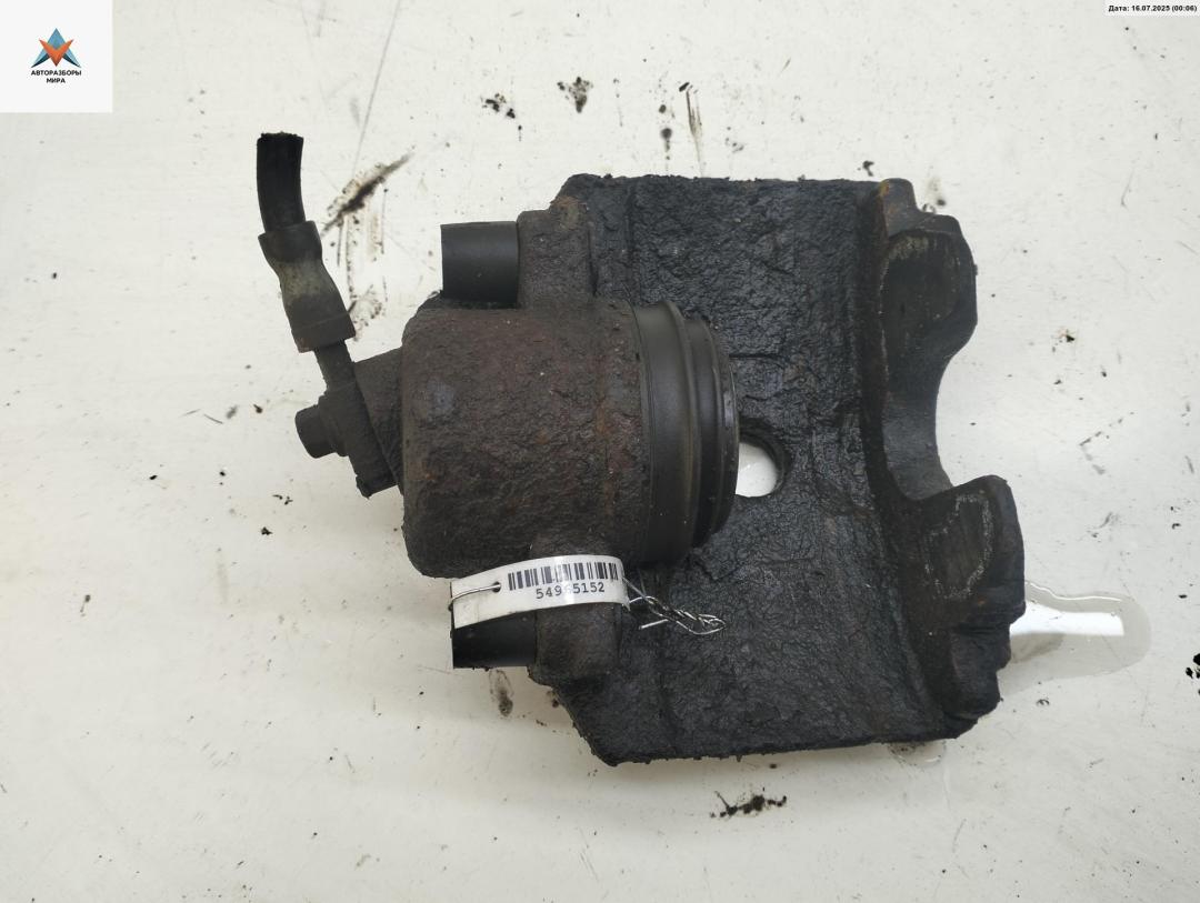 суппорт передний правый Volkswagen Golf 5 поколение 2004, 1.4 л., бензин, МКПП, серый, хетчбэк 5 дв. - фото №1