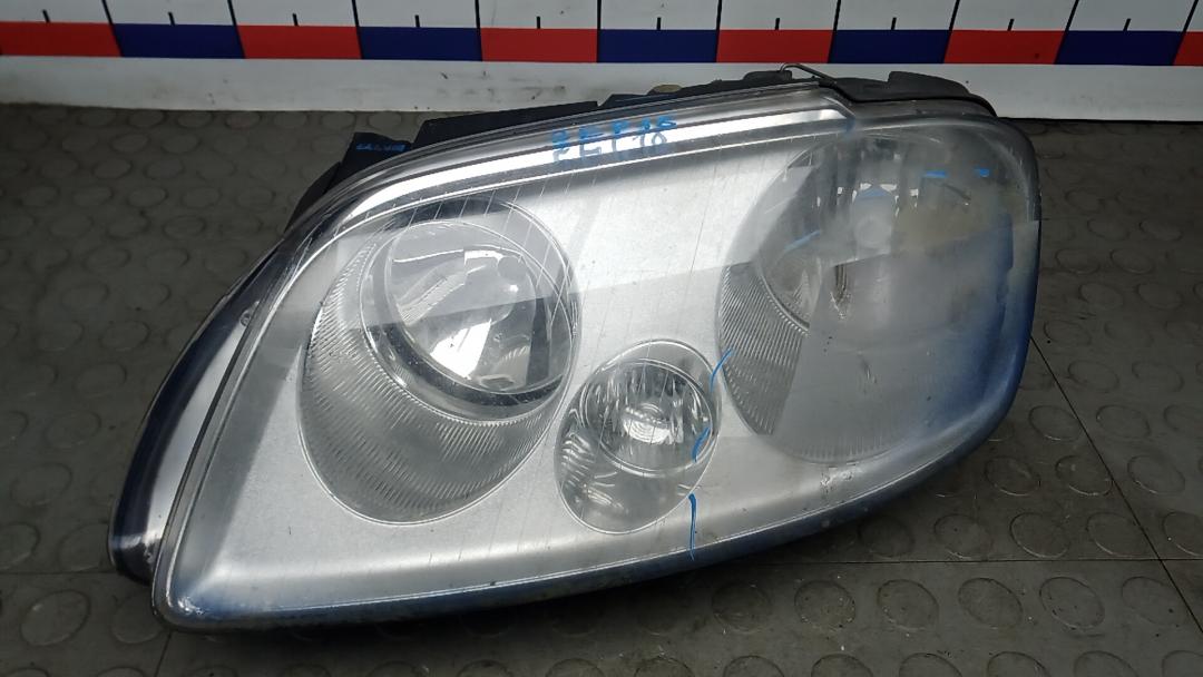 фара левая Volkswagen Touran 1 поколение 2005, 1.9 л., дизель, МКПП, минивэн, 2K0941005C - фото №1