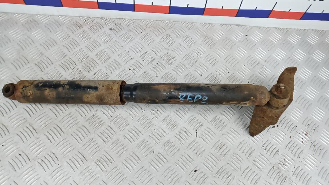 амортизатор задний Mitsubishi L200 4 поколение 2006, 2.5 л., дизель, МКПП, пикап, MR992632 - фото №1