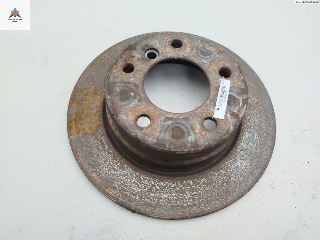 диск тормозной задний BMW 1 серия E81/E82/E87/E88 2005, 1.6 л., бензин, МКПП, чёрный, хетчбэк 5 дв. - фото №1