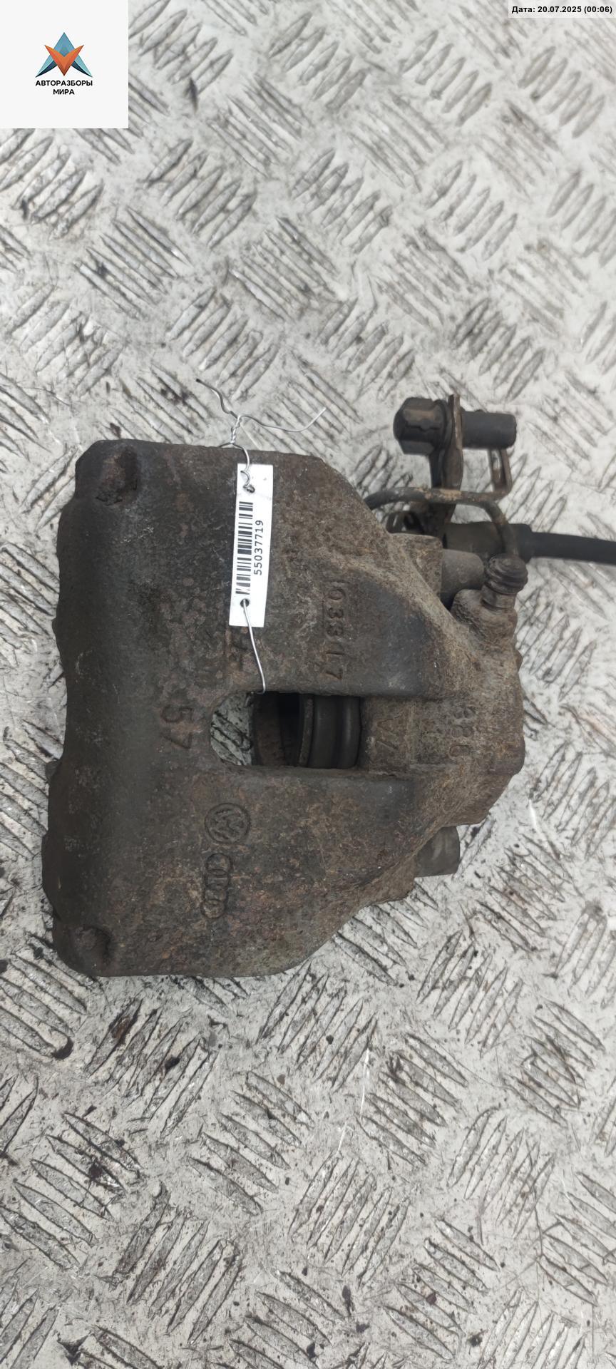 суппорт передний левый Audi A4 B6 2002, 2.5 л., дизель, МКПП, синий, универсал - фото №1