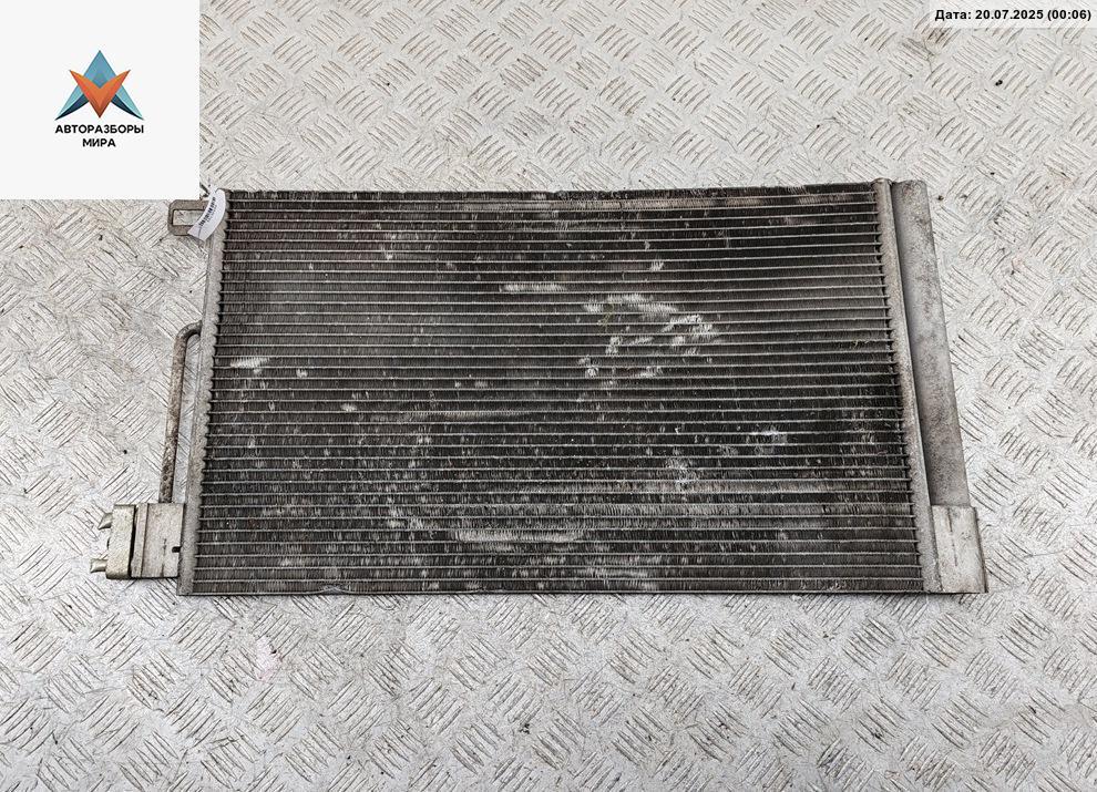 радиатор кондиционера Opel Corsa D 2009, 1.2 л., бензин, МКПП, чёрный, хетчбэк 5 дв. - фото №1
