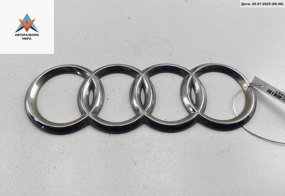 эмблема Audi A6 4A/C4 1996, 2.0 л., бензин, МКПП, серый, седан - фото №1