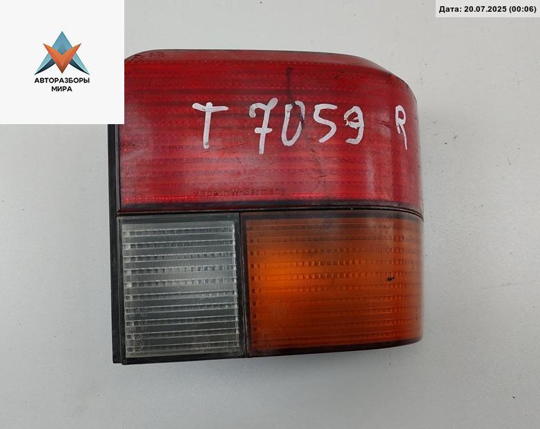 фонарь задний правый Volkswagen Transporter T4 1992, 2.4 л., дизель, МКПП, серый, микроавтобус, 70194511 - фото №1