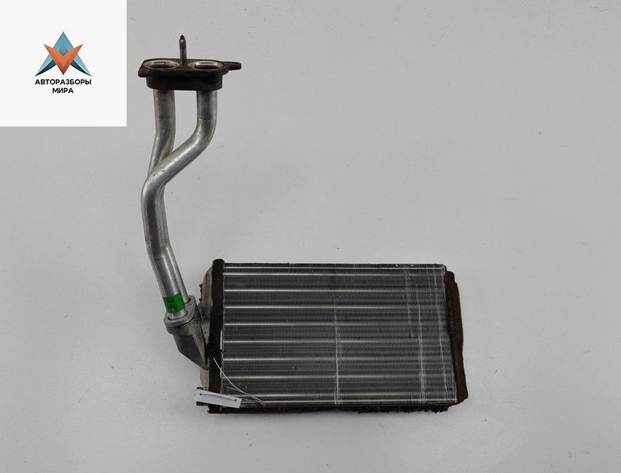 радиатор отопителя (печки) BMW 3 серия E36 1994, 1.6 л., бензин, МКПП, чёрный, хетчбэк 3 дв. - фото №1