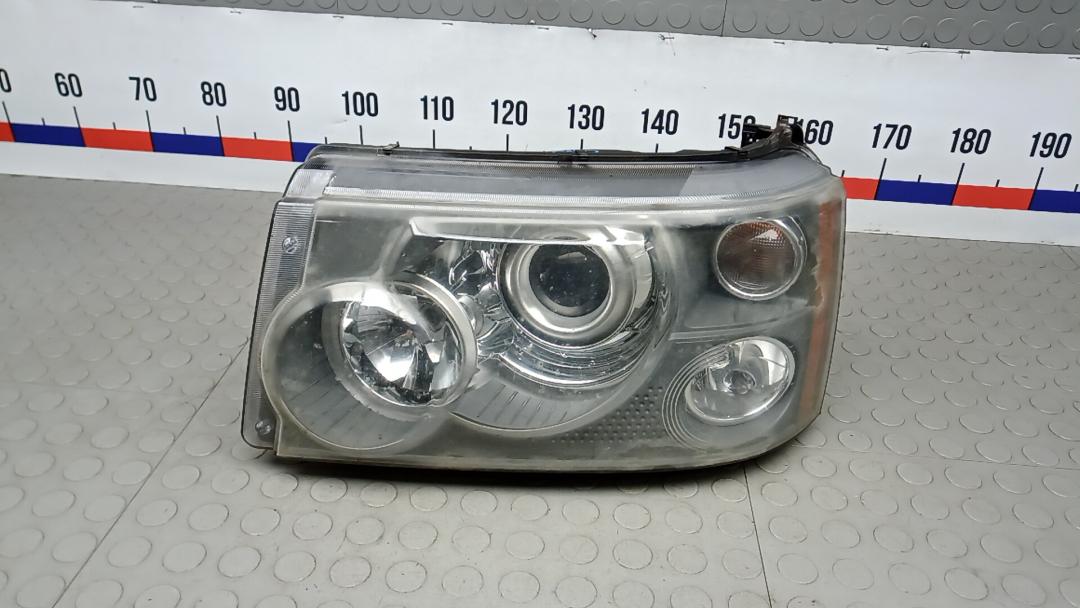 фара левая Land Rover Range Rover Sport 1 поколение 2008, 2.7 л., TDVM, дизель, АКПП, внедорожник 5 дв. - фото №1