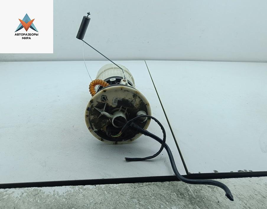 насос топливный Ford Focus 2 поколение 2005, 1.6 л., i, бензин, МКПП, серый, хетчбэк 5 дв., 3M519H307 - фото №1