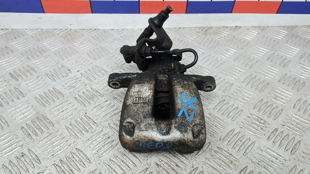 суппорт задний правый Volkswagen Jetta 5 поколение 2008, 1.9 л., дизель, МКПП, седан, 1K0615424M - фото №1